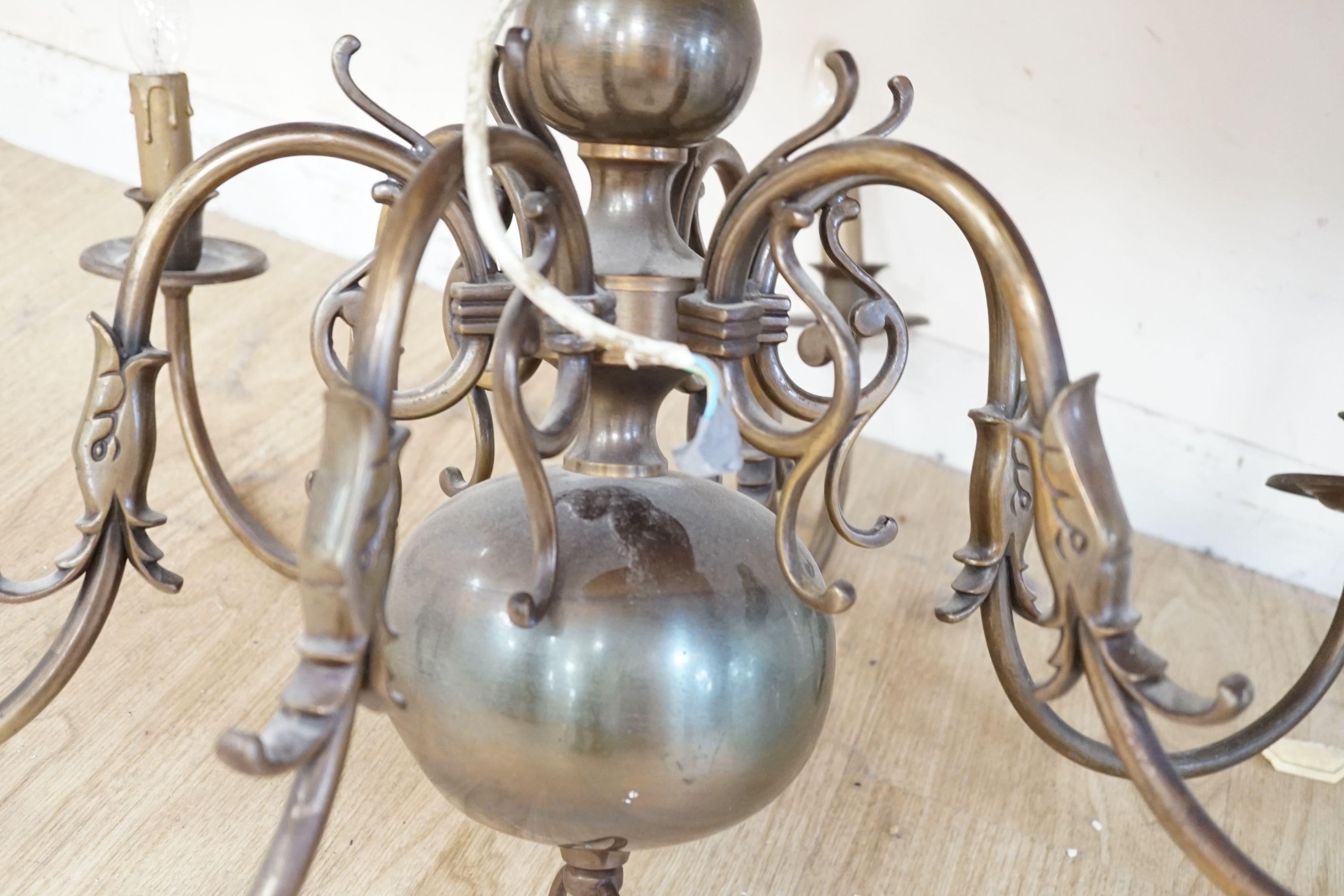 A six light brass Dutch style electrolier, 75 cms high.